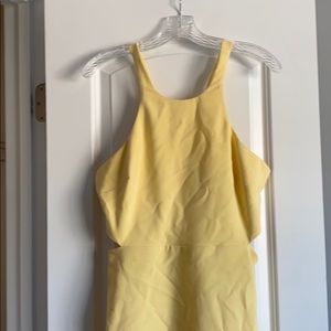 Yellow mini dress with side cut out